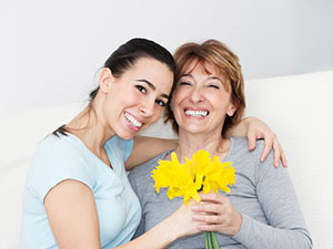 Two women with flowers