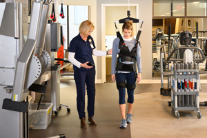 Female patient in the Bioness Vector Gait Training System