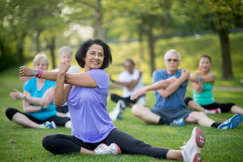 People exercising in a park - GW Hospital