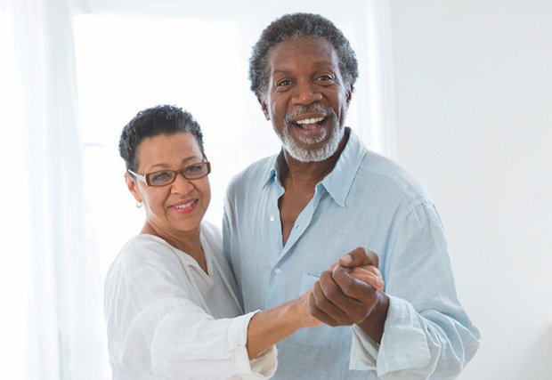 A husband and wife dancing together