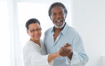 A husband and wife dancing together
